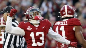 Alabama defensive back Malachi Moore (13) reacts after a defensive play against Auburn during the first half of an NCAA college football game, Saturday, Nov. 30, 2024, in Tuscaloosa, Ala. (AP Photo/Butch Dill)
