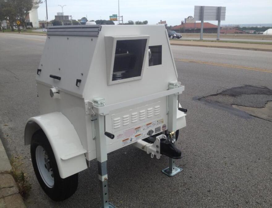 Akron already uses unmanned traffic cameras, like the one pictured, in school zones. The police department is requesting $18,000 for speed radar guns that would be operated by police officers.