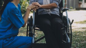Young asian caretaker with 60s asia elderly woman consulting and encourage, take a history and recommend the right treatment to live happily in retirement, holding hands and encouraging