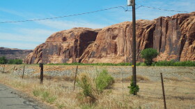 The Wall Street climbing area is seen from across the Colorado River near Moab, Utah.