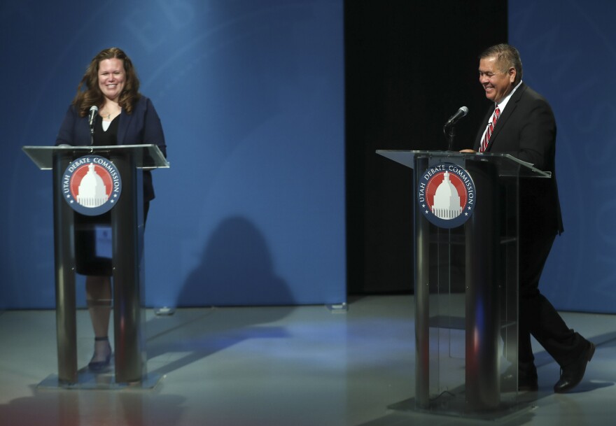 Photo of candidates on debate stage.