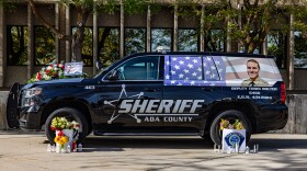 A temporary memorial featuring Deputy Tobin Bolter’s patrol vehicle is set up in front of the Ada County Sheriff's Office (7200 W. Barrister Dr in Boise). Star Police, Kuna Police and Eagle Police substations also have dedicated memorial spots.