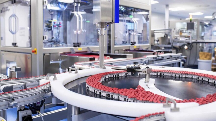 This photo provided by Pfizer shows the production of the COVID-19 vaccine for children under 5 in May 2022 in Puurs, Belgium.