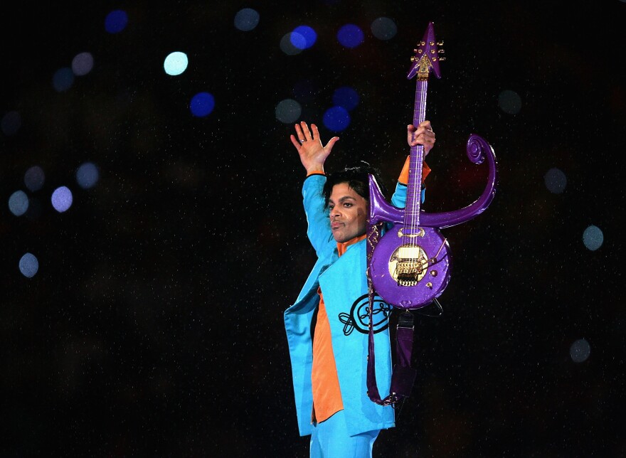 Prince performs during the halftime show at Super Bowl XLI  in 2007.