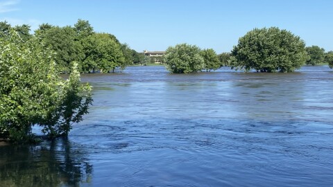 Flooding of the Big Sioux River in the Riverside neighborhood of Sioux City is shown on Monday, June 24, 2024, near Riverside Park, somewhat south of where a team of people pulled a woman from the river on Sunday. (Photo by Jeana Guy)
