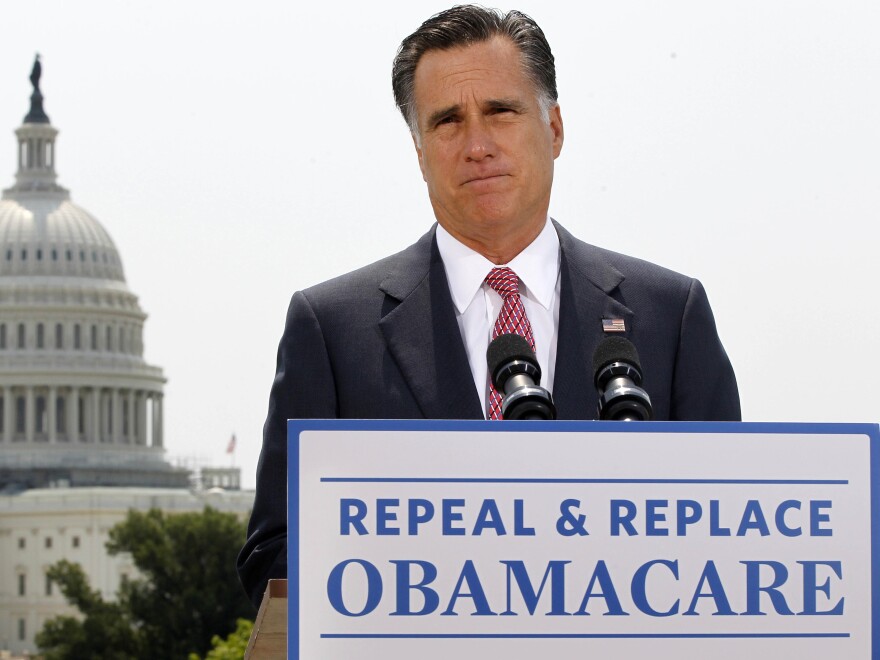 Republican presidential candidate Mitt Romney talks about the Supreme Court's health care ruling near the U.S. Capitol in Washington in late June.