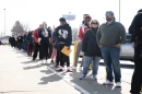 People stand in line at the Chicago West Secretary of State Facility to apply for a Real ID April 12.
