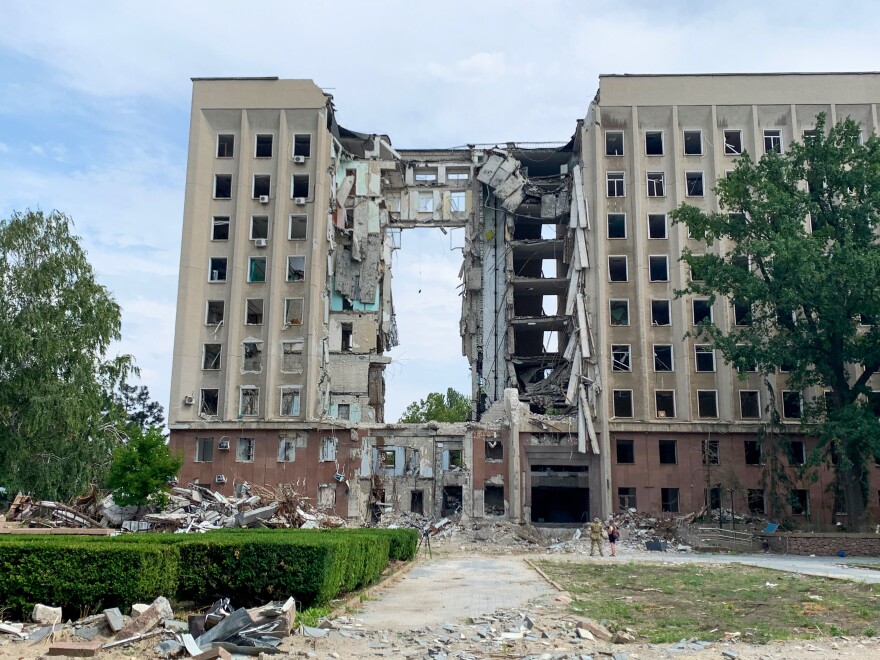 The building housing Mykolaiv's regional government, bombed early in the war, lies in ruins on Aug. 11. Governor Vitaliy Kim says he knew he was the target "because it was my window." Thirty-seven of his colleagues died in the bombing.