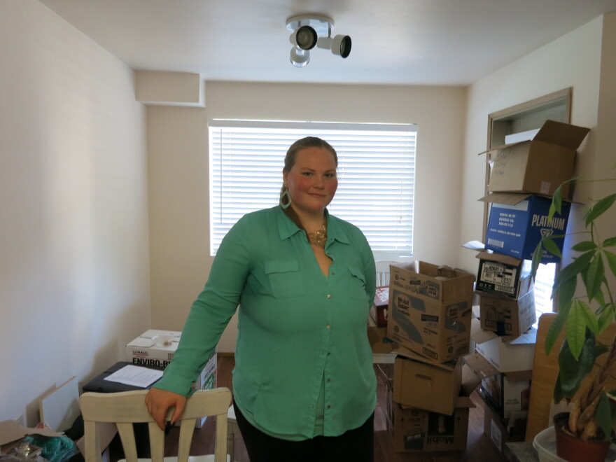 Anelise Moon-Schruder, 24, shown here in her Lake City apartment, is part of the white anti-racist movement.
