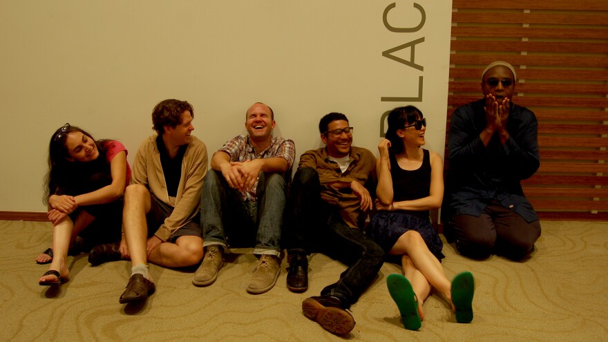 Beauty Pill sits outside Artisphere's Black Box Theatre, where the band would record <em>Beauty Pill Describes Things As They Are</em>.