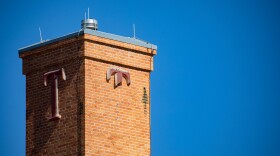 The "T" logo on a campus building at Travis Early College High School has worn down. This election season, Austin ISD is putting before voters a $2.44 billion bond package that would modernize and renovate schools.