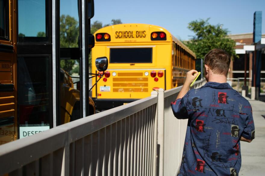 Conor Mills walks to a school bus