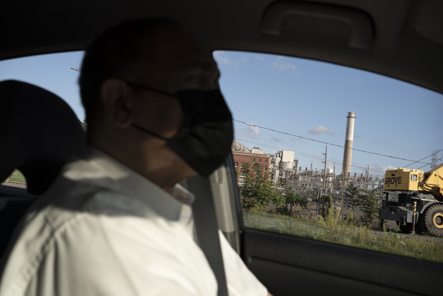 Dr. Mark Mitchell, former director of Hartford's health department and a founder of the Connecticut Coalition for Environmental Justice, drives his car along the South Meadows neighborhood of Hartford, Conn., on Tuesday, Sept. 13, 2022. Mitchell says his research and work have led him to believe that the state's asthma rates are heavily tied to traffic-related air pollution, as well as other air pollutants: "Connecticut has the highest air pollution of any state east of the Mississippi."
