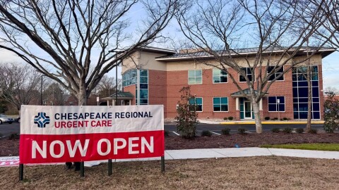 A sign announces the opening of Chesapeake Regional Healthcare’s new urgent care and imaging center on Hanbury Road in Chesapeake. The facility pairs walk-in care with on-site MRI, CT, ultrasound and X-ray services.