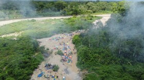 Hundreds of people sleep in tents each day outside Bajo Chiquito, the first village that migrants encounter in Panama after making the grueling trek across the Darién jungle.