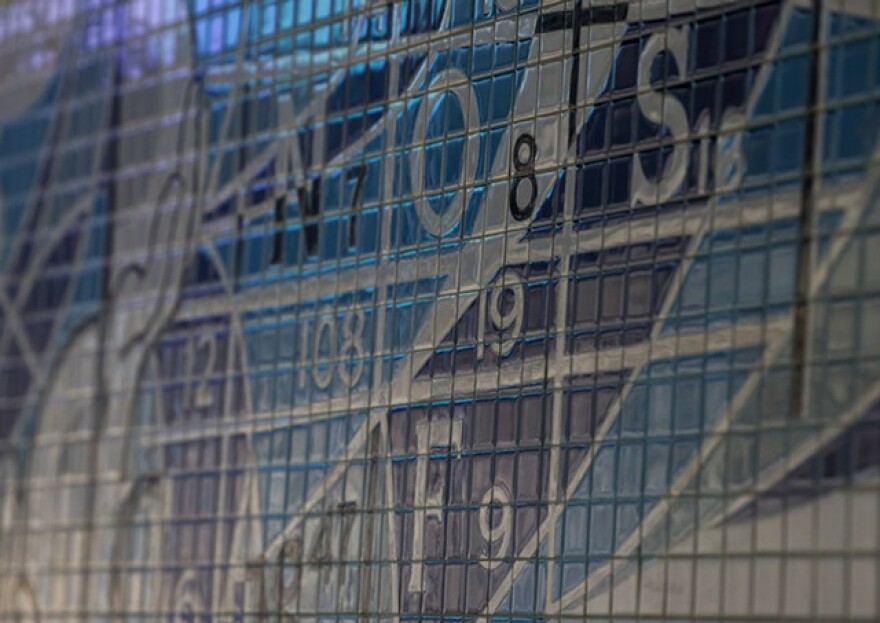 The mosaic appears to incorporate fundamental elements of science that make photography and film possible — the symbols for silver (Ag), nitrogen (N), Carbon (C), and Oxygen (O) are all present.