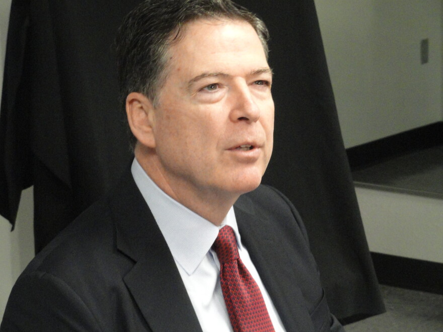 James Comey speaks to the media before his speech
