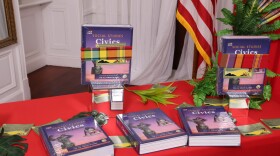 Pictured: Official unveil the new VI-Centric Civics textbook.
