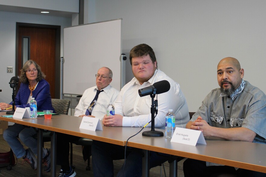 Soldotna City Council candidates Lisa Parker, Dave Carey, Garrett Dominick and Erick Hugarte participate in a candidate forum at the Soldotna Public Library.