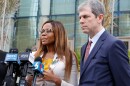   U.S. Rep. Sheila Cherfilus-McCormick, D-Fla., left, speaks to the media as her lawyer David Markus looks on after a hearing in federal court Monday, Dec. 29, 2025 in Miami. (AP Photo/Terry Renna)