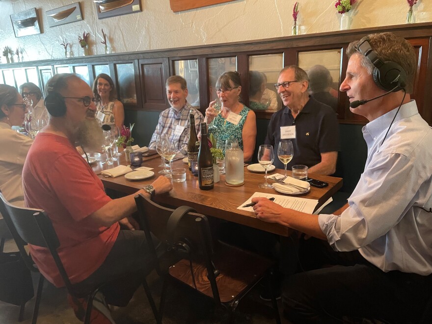 Host Steve Kraske (right) chats with master sommelier and master of wine Doug Frost (left) at Earl's Premier in Kansas City.