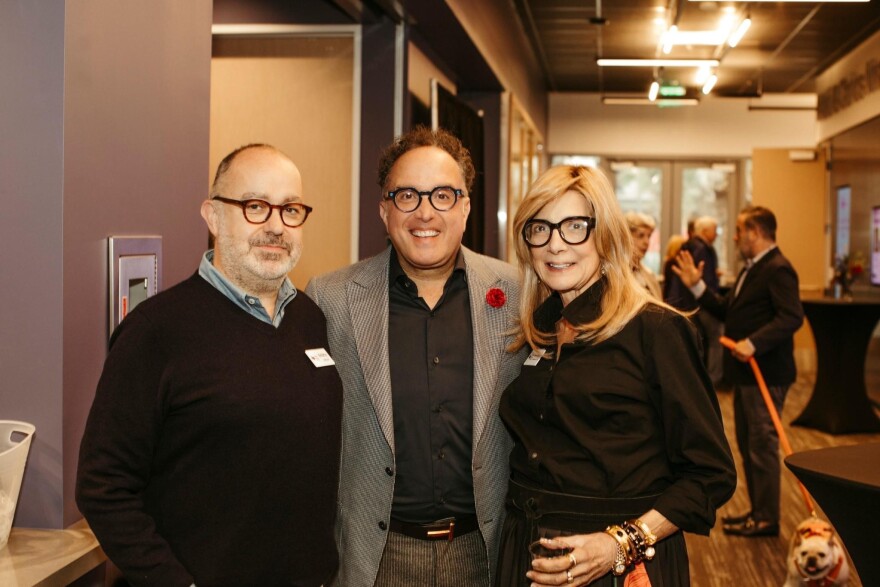 Joyce Slocum with Robert Salluce, TPR's vice president of marketing and communications (left) and Guillermo Nicolas.