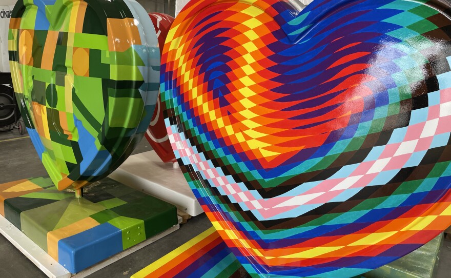 When artists completed their hearts, they dropped them off at Dimensional Innovations to be sprayed with a protective, clear coat before outdoor installation.