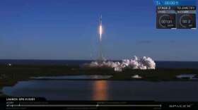 A rocket takes off amid a plume of smoke from Cape Canaveral.