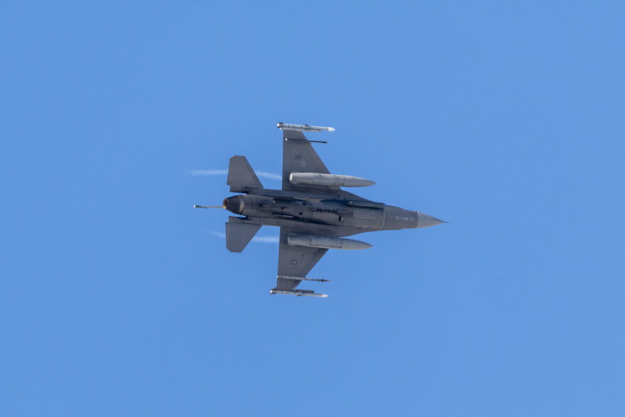 A U.S. Air Force F-16 Fighting Falcon, assigned to Ohio National Guard’s 180th Fighter Wing, flies over the flightline before landing at Joint Base Elmendorf-Richardson, Alaska, during U.S. Northern Command Exercise ARCTIC EDGE 2022, March 14, 2022. AE22 is a biennial homeland defense exercise to provide high quality and effective joint training in austere cold weather conditions. (U.S. Air National Guard photo by Staff Sgt. Kregg York)