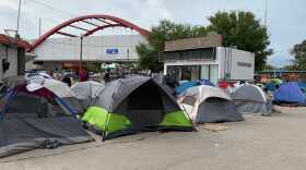 Pictured are tents at a migrant camp in Matamorros, Mexico in 2019 where hundreds of asylum-seekers were sent to wait for their cases to be heard under Trump's "Remain-in-Mexico" policy.