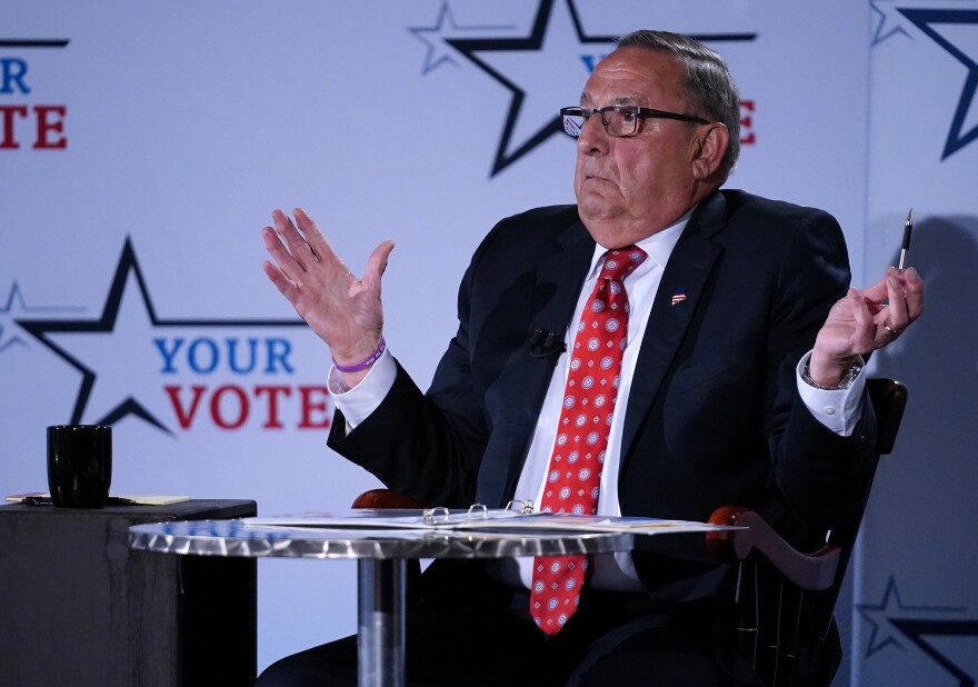 Republican Paul LePage participates in a gubernatorial debate, Tuesday, Oct. 4, 2022, at the Franco Center in Lewiston, Maine. LePage is challenging Democratic Gov. Janet Mills.