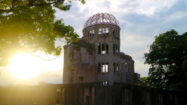 The Atomic Bomb Dome was originally the Hiroshima Prefectural Industrial Promotion Hall. It stood only 160 meters from the atomic blast hypocenter on August 6, 1945. Because the blast hit almost directly from above, the outer walls and steel dome frame partially survived. It is now a permanent UNESCO World Heritage Site.