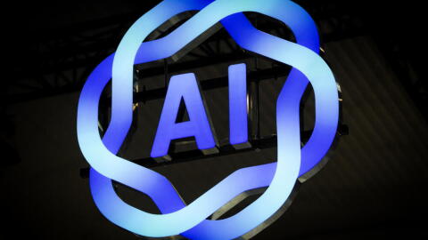 Signage of AI is displayed during the MWC (Mobile World Congress), the world's biggest mobile fair, in Barcelona on March 3, 2025. (Manaure Quintero/AFP via Getty Images)