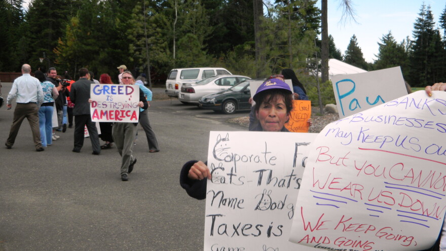 Anti-poverty protestors outside The Association Of Washington Business Summit at Suncadia Resort on Wednesday.