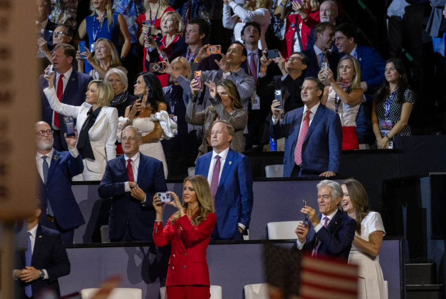 Texas Attorney General Ken Paxton, the state's GOP nominee for U.S. Senate, listens as President Donald Trump addresses the Republican midterm convention crowd in Dallas on Thursday, Sept. 10, 2026.