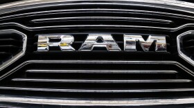 This grill of a Ram truck is on display at the Pittsburgh Auto Show, on Feb. 15, 2018. The Department of Justice released new details of a settlement with engine manufacturer Cummins Inc. Wednesday, Jan. 10, 2024, that includes a mandatory recall of 600,000 Ram trucks, and that the company remedy environmental damage it caused when it illegally installed emissions control software in several thousand vehicles, skirting emissions testing.