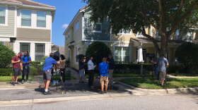 Protesters begin gathering at the Orlando townhome of Derek Chauvin. (WMFE file photo/2020)
