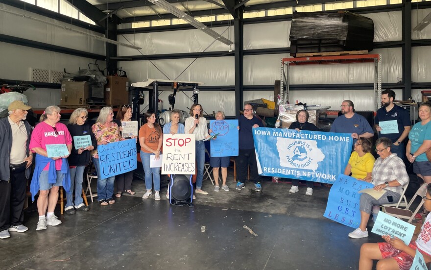 Residents of manufactured homes in Johnson County at a press conference organized by Johnson County Residents United on June 18.