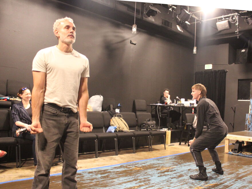 Urbanite Theatre has configured the space as a 'traverse stage' to facilitate a tennis-court-like back and forth between the actors during scenes like this one.