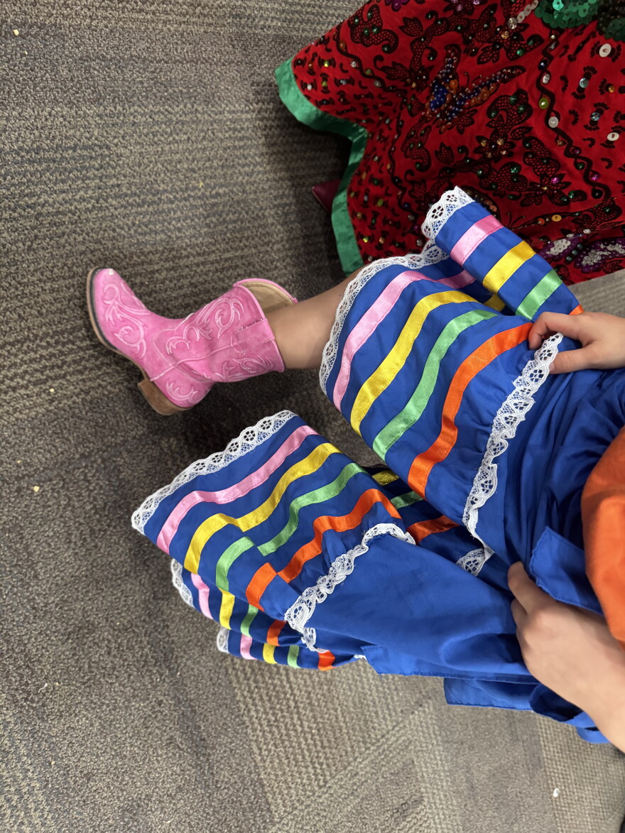 Pink, non-negotiable mexican boots worn by
