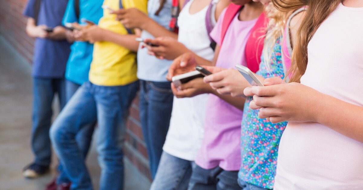 Report finds mixed success for school cell phone bans