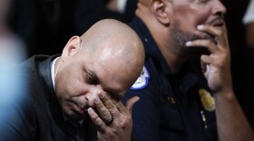 FILE - U.S. Capitol Police Sgt. Aquilino Gonell, left, and U.S. Capitol Police Sgt. Harry Dunn react as they watch a video as the House select committee investigating the Jan. 6, 2021, attack on the U.S. Capitol holds a hearing on Capitol Hill in Washington, Oct. 13, 2022. A visit to the Pennsylvania House floor by the two former police officers who helped protect the U.S. Capitol during the Jan. 6 riot drew boos and walkouts by some Republican members on Wednesday, June 5, 2024, as the chamber was wrapping up business for the week. 