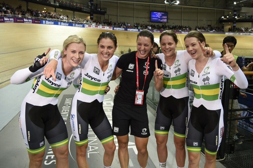 Melissa Hoskins, second from left, celebrates with other members of the Australian team after winning the Women's Team Pursuit Finals at the UCI Track Cycling World Championships in Saint-Quentin-en-Yvelines, near Paris, in 2015.