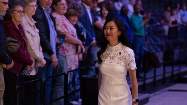 Wichita Mayor Lily Wu walks through the crowd before delivering the State of the City address at Century II.