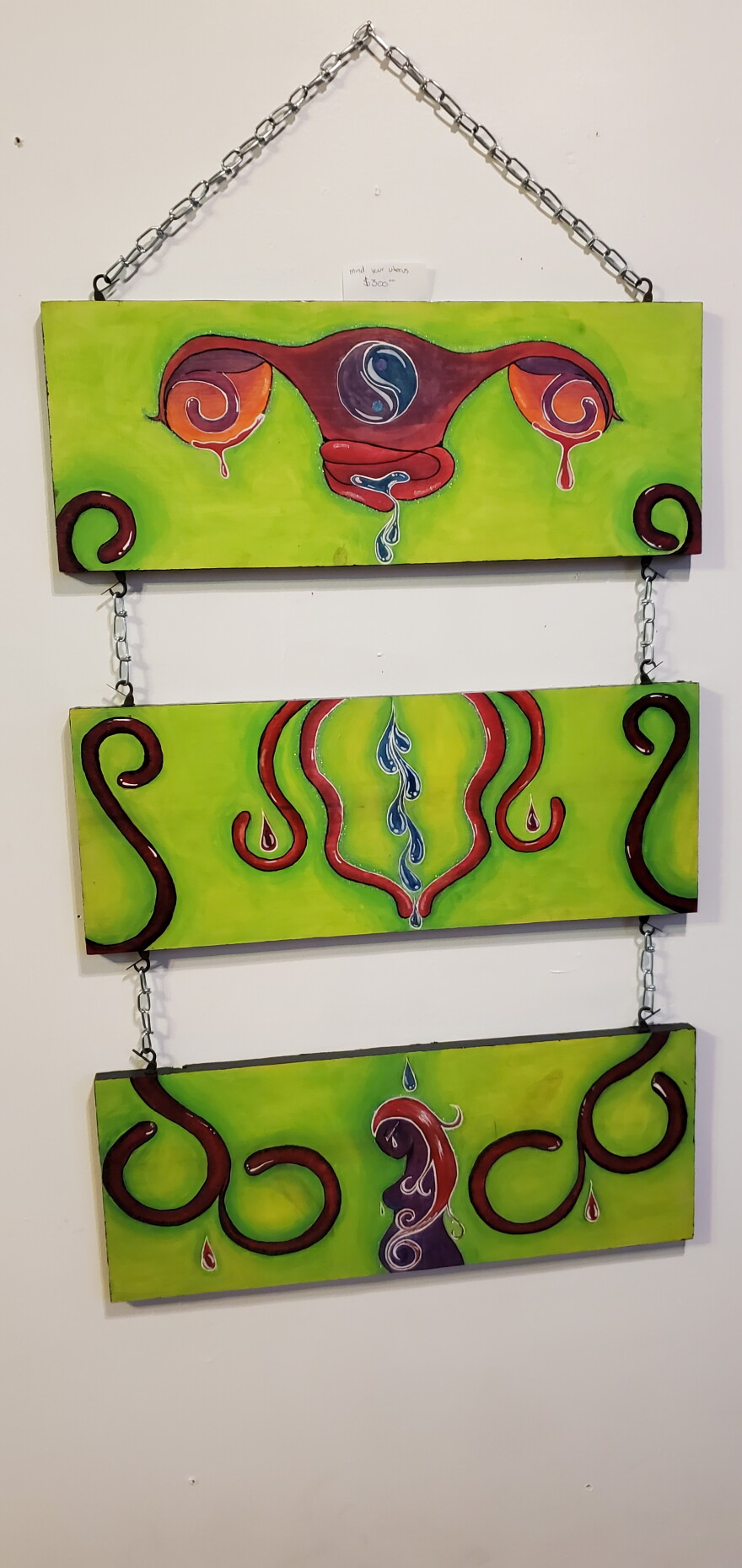 Sya Ryn's piece "Mind Your Uterus." She created this around the time some states overturned Roe v. Wade.
