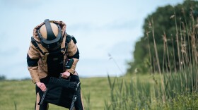 Air Force Staff Sgt. Amanda Hungness neutralizes a downed drone during an April 2024 exercise at Langley Air Force Base in Virginia. The joint exercise with NASA tested the ability of airmen to dismantle and eliminate potentially dangerous drones.