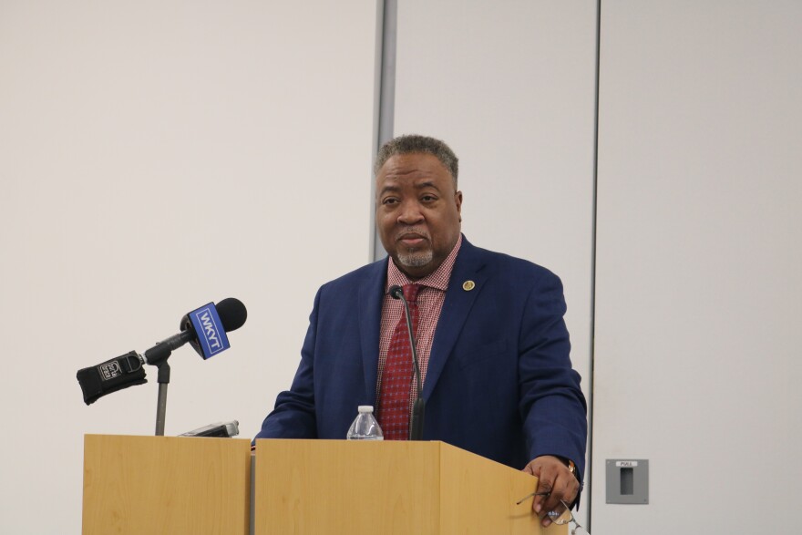 Former Fayette County Public Schools executive director of financial accounting Rodney Jackson speaks with media July 20, 2026, at the Marksbury Family Branch Library in Lexington during a news conference he called to announce pending legal action regarding the ongoing school district budget crisis.