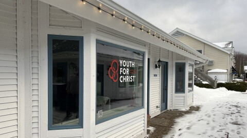 A building owned by Apollos Properties overlooking Leland’s historic Fishtown sits empty pending a federal lawsuit over Youth for Christ’s desire to open a youth ministry in the commercially zoned business district. (Photo: Jacob Wheeler/Glen Arbor Sun)