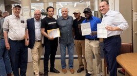 LORIB-backed Santos Javier (second from right) joined by Rep Ramon Perez and Senate Majority Leader Frank Ciccone (center)