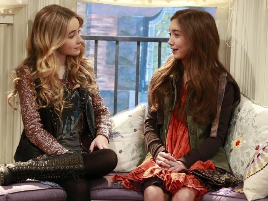 Rowan Blanchard (right) plays Cory and Topanga's 13-year-old daughter, Riley, and Sabrina Carpenter plays her "bad" best friend, Maya, on Girl Meets World.